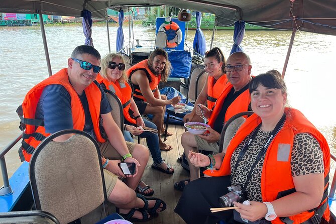 1-Day Cai Rang Floating Market-Biking & Cu Chi Tunnel Trip - Breakfast on a food-court boat