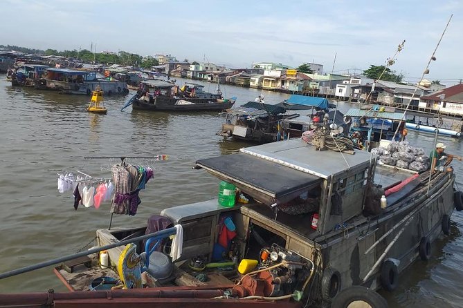 1-Day Cai Rang Floating Market-Vinh Long-Cai Be-Group of 10 Max - Stepping onto a merchant boat
