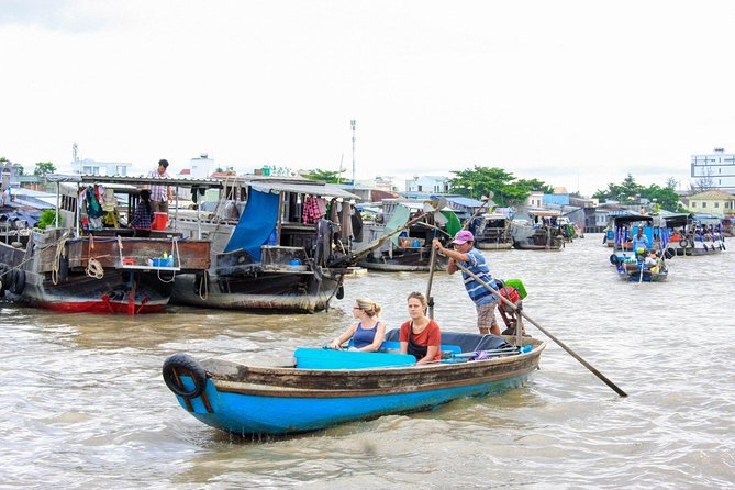 2-Day Cu Chi Tunnels & Mekong Delta - Cai Rang Floating Market - Noodles, rice paper, and orchard cycling