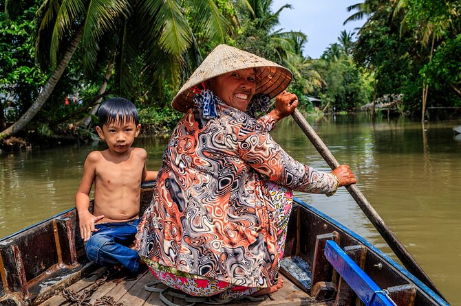 3 Days Mekong Delta Tours from Ho Chi Minh to Phnompenh - Ben Tre, ferries, and the commercial side of the delta