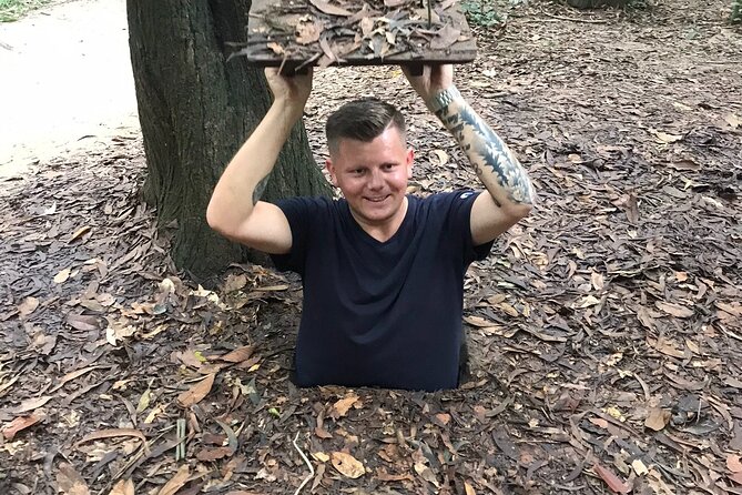 6 Hours Historical Tour in Cu Chi Tunnel with Free Snack - Hidden doors and war-era traps