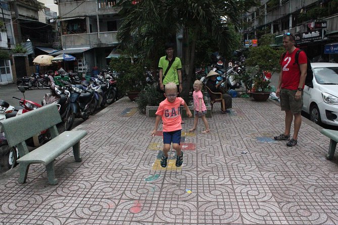 Afternoon Saigon Unseen Adventure by Scooter |Opt: Ao Dai Riders - Thien Hau Pagoda in Ho Chi Minh City’s Chinese Quarter