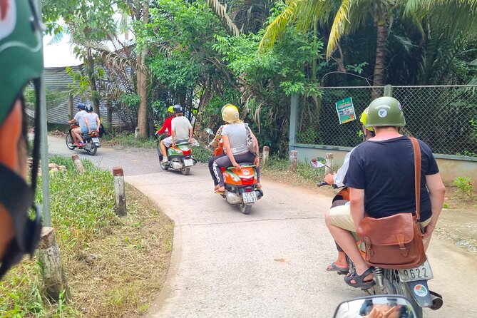 Ben Tre Mekong Zig Zag: Scooter, Sailboat, and Food (Full day) - Sailing a quiet Mekong tributary