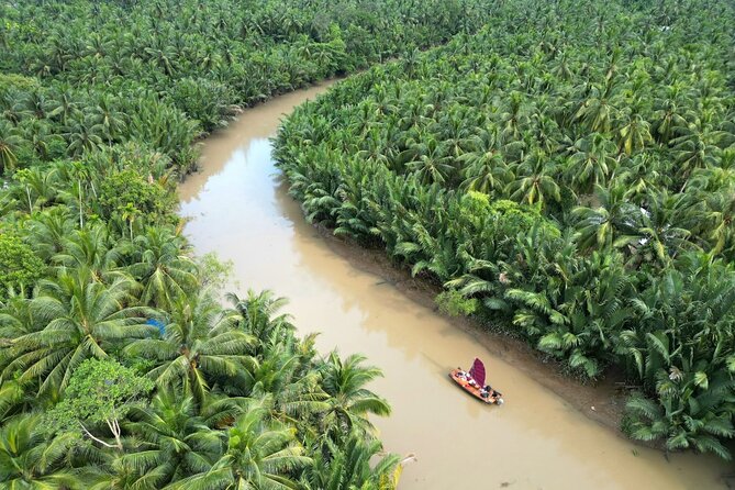 Ben Tre Mekong Zig Zag: Scooter, Sailboat, and Food (Full day) - Village homes, plants, fruit, and local conversation