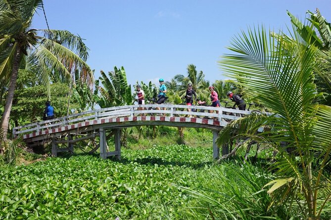 Bike And Boat Mekong Delta Cycling Tour - A 30-minute private boat ride on a Mekong tributary