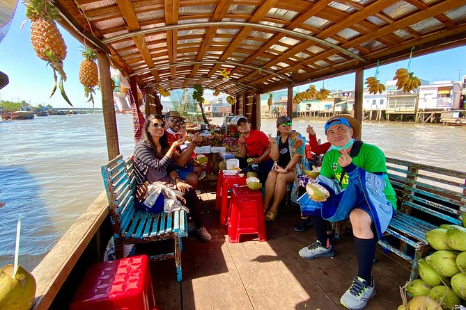 Cai Be Mekong Delta Tour: Cooking Class, Cycling & Craft Villages - Coconut candy, rice popcorn, and folk music