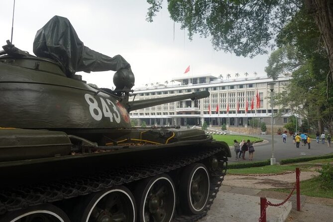 City explore combined with Food taste, Private tour on motorbike - War Remnants Museum in a short but serious visit