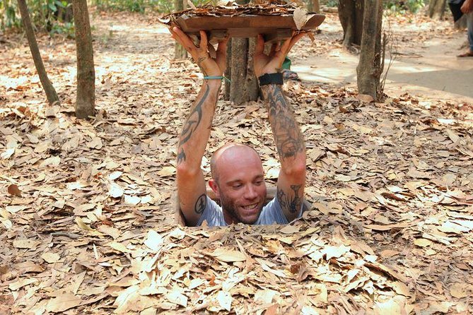 Cu Chi Luxury Group Tour - Tapioca and Cake Half Day - Crawling through a visitor-sized tunnel
