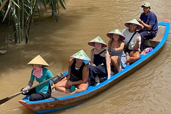 Cu Chi & Mekong Delta Day tour - Cruising past fish rafts and river homes