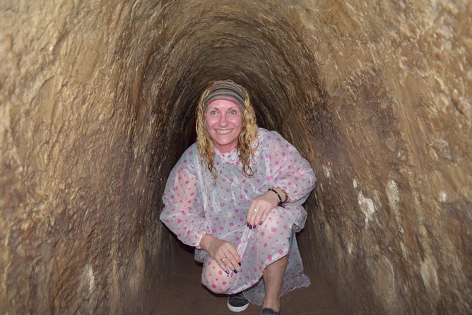 Cu Chi Tunnel Half Day Group Tour With Guide - Entering the Cu Chi Tunnels
