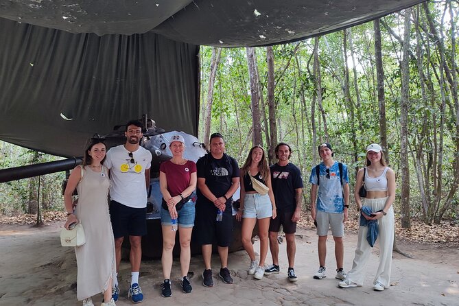 Cu Chi tunnel & Mekong Combined In One Day Tour Excursion - Entering the underground city at Cu Chi