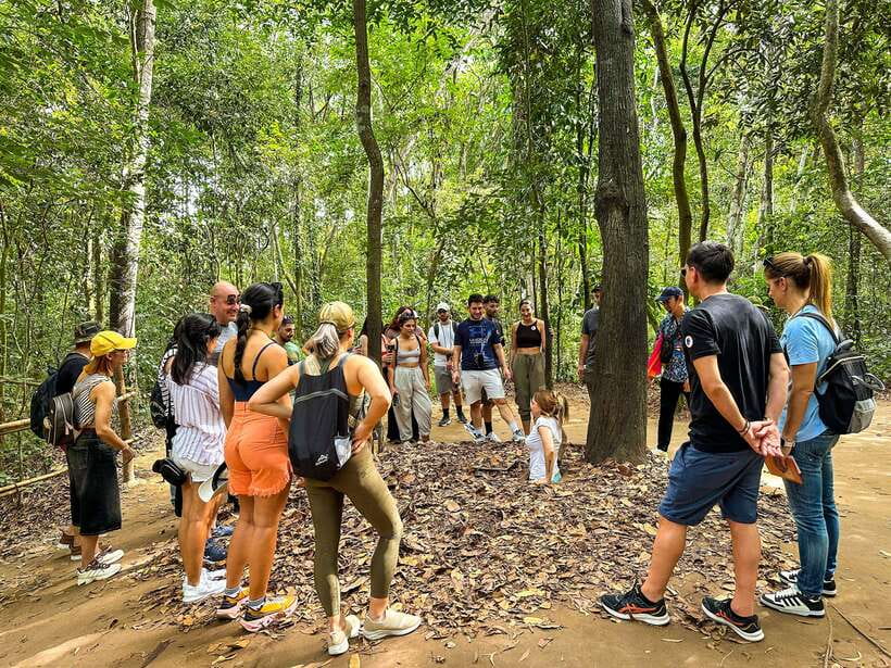 Cu Chi Tunnels Afternoon Trip from Ho Chi Minh City - Walking through kitchens, bedrooms, and hospitals