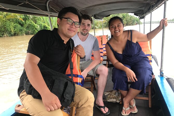 Cu Chi Tunnels and Mekong Delta Signature Tour - The sampan through coconut-lined canals