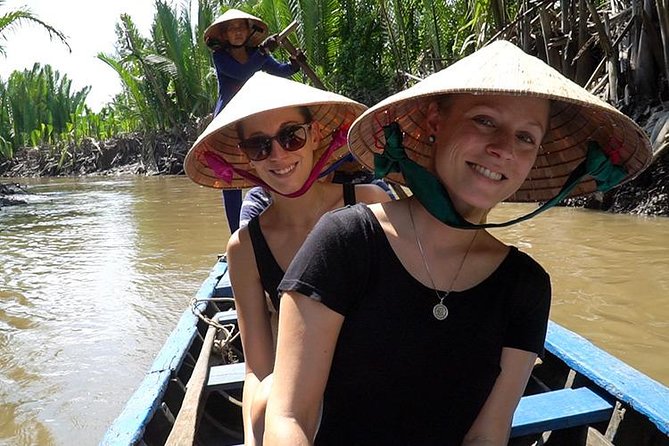 Cu Chi Tunnels & Mekong Delta Full Day Tour - Entering the Cu Chi Tunnels