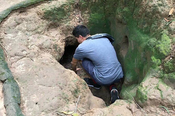 Cu Chi Tunnels tour In The Morning by DGT - Crawling Through the Narrow Tunnel