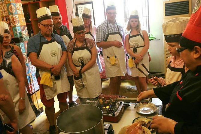 Experience half-day cooking class with market visit - Fruit carving adds a playful skill