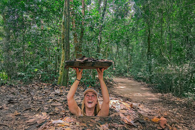 Explore Cu Chi Tunnels & Saigon History 1 Day Tour - Entering the Cu Chi Tunnels