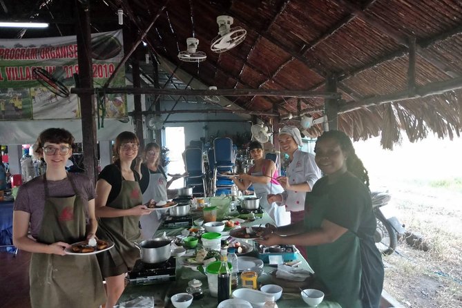 Farm-To-Table Healthy Cooking Class in Ho Chi Minh City - Cutting your own herbs for lunch