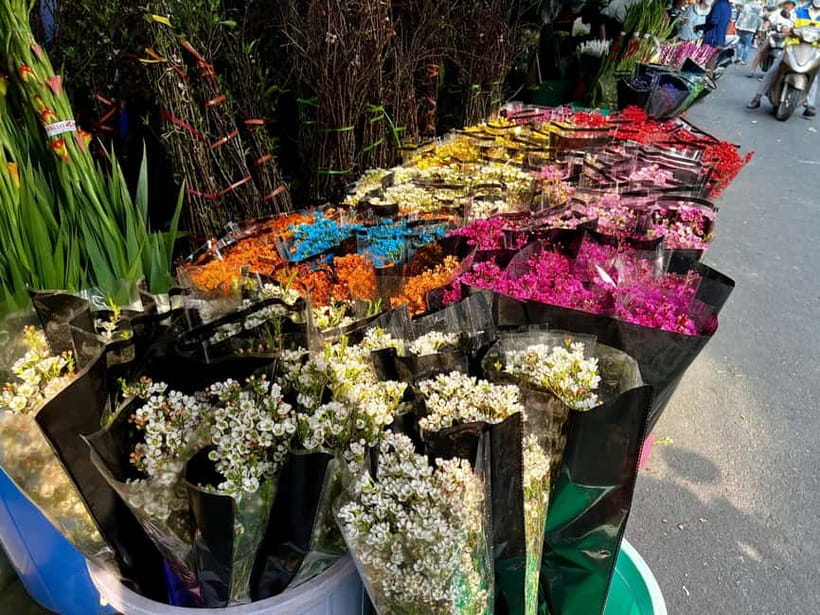Free E-Sim Saigon Hidden Gems Tour with Local Guide - Ho Thi Ky Market, flowers, food, and young Saigon