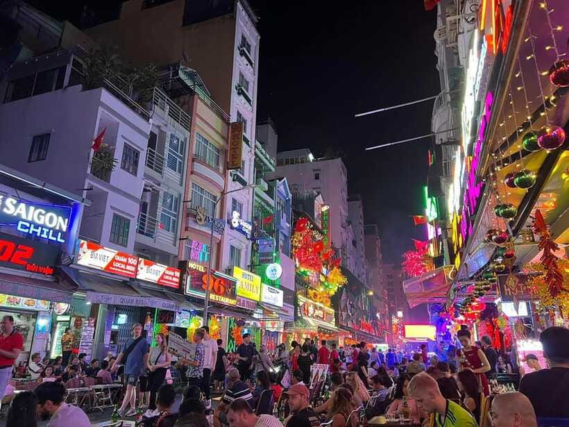 Free E-sim Saigon Nightlife Hopping Tour - Walking toward Bui Vien Walking Street
