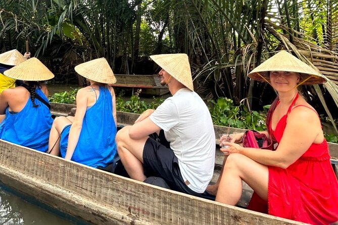 From HCM City: Mekong Delta Tour with Sampan Journey - Fruit, honey tea, folk music, and island life