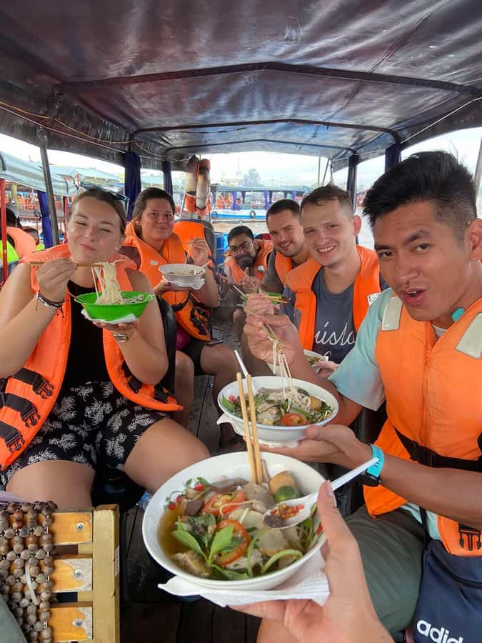 From HCM: Mekong Delta & Cai Rang Floating Market 2-Day Tour - Rice noodles, a local market, and an ancient house