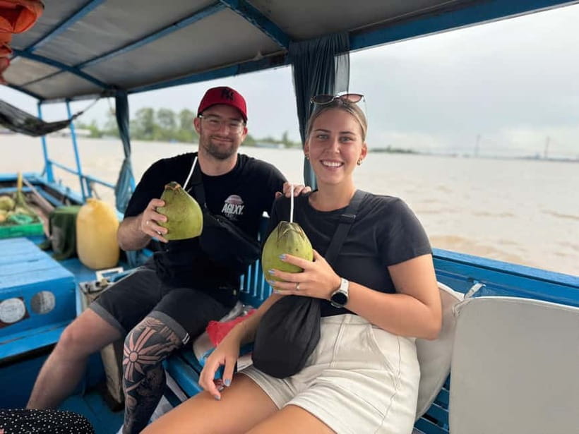 From Ho Chi Minh: Cai Be Boat & Bike Mekong Delta Experience - A sampan through coconut-shaded canals
