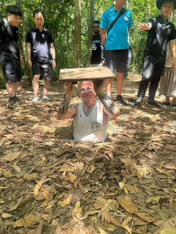 From Ho Chi Minh City: Cu Chi Tunnels Half-Day Tour - Walking through the tunnels and seeing the traps