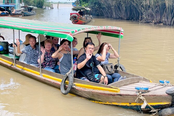 From Ho Chi Minh City: Discover Mekong Delta & Coconut Village - Coconut Island combines food, music, and village activities