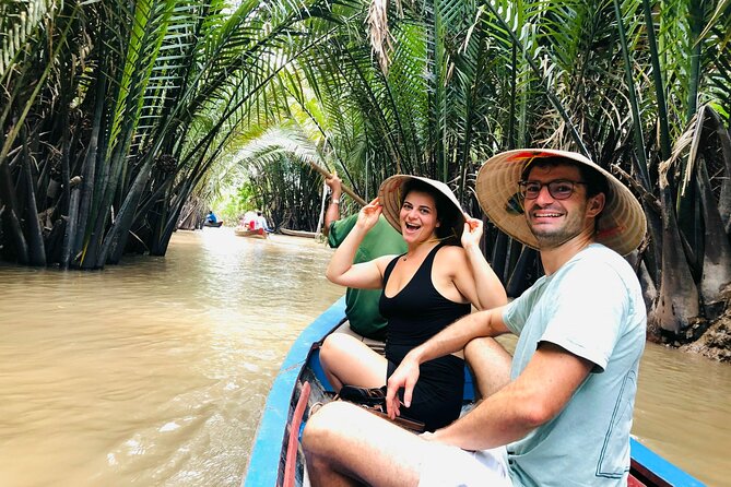 From Ho Chi Minh City: Discover Mekong Delta & Coconut Village - The Tien River shows the Delta at working speed