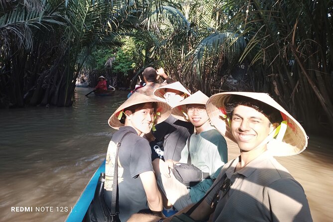 Full Day Cu Chi Tunnel and Mekong Delta Small Group with Lunch - Cruising the upper Mekong River near My Tho