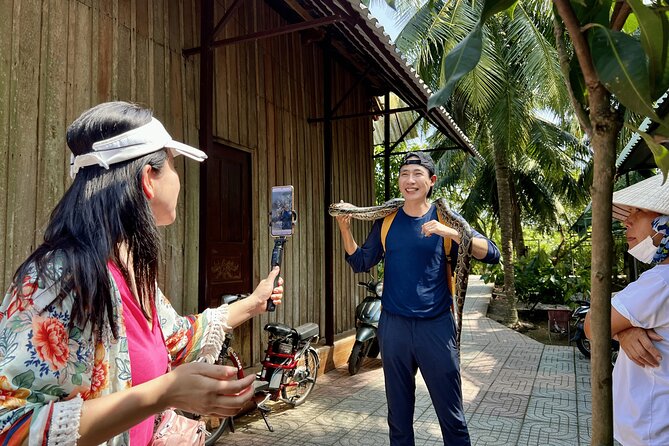 Full Day Guided Mekong Delta Day Tour in Vietnam (Multilingual) - Lunch, snacks, and what the $35.40 price covers