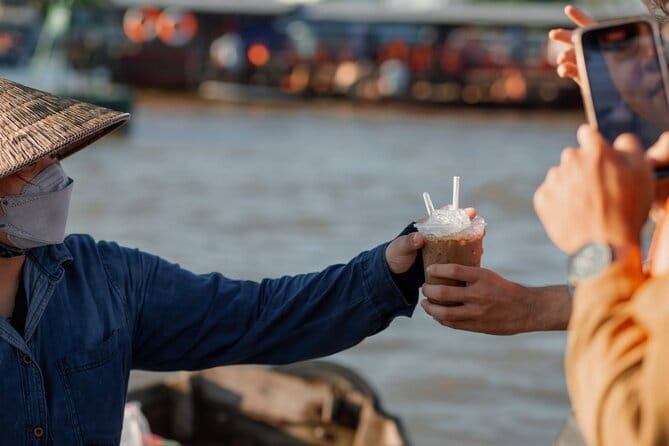 Hau River Floating Market and Con Son Islet Adventure - Fish farming and the Koi fish massage