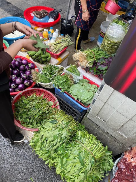 HCMc:Vietnamese Cooking Class with Local market tour & Meal - Eating the meal you helped prepare