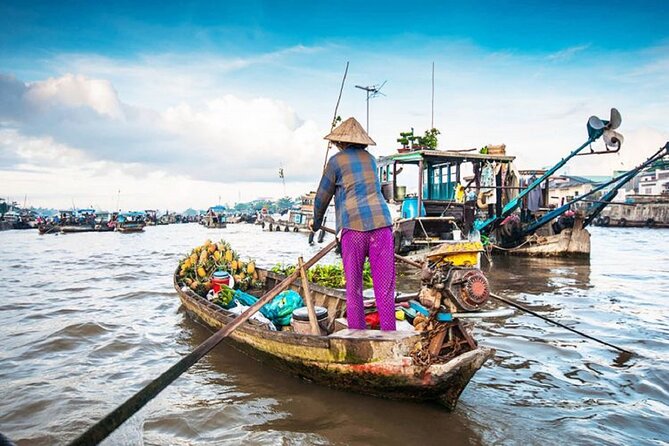 Ho Chi Minh: Best Price Should Visit Mekong Delta - A rowing boat beneath the water coconut trees