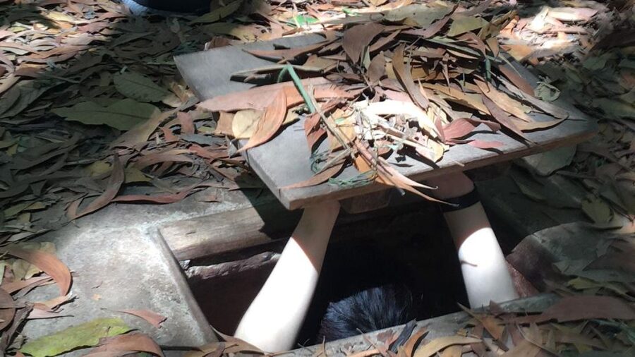 Ho Chi Minh City: Cu Chi Tunnels and Gun Shooting Experience - Entering the narrow tunnels
