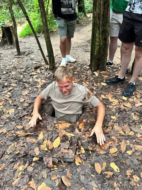 Ho Chi Minh City: Cu Chi Tunnels Morning or Afternoon Tour - Traps, hidden doors, and guerrilla tactics