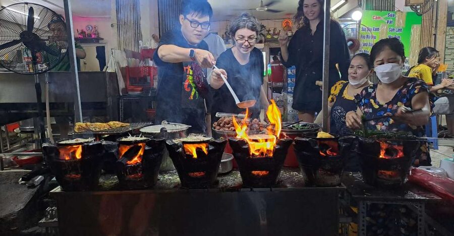 Ho Chi Minh City: Food Tour by Scooter with Eleven Tastings - District 10: crispy rice and fried bao