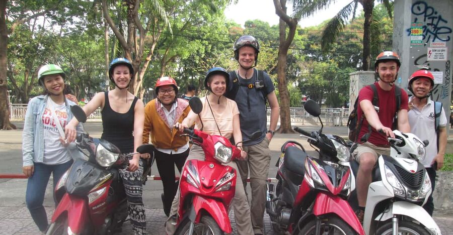 Ho Chi Minh City: Ghost, Belief & Culture Tour on Motorbike - Riding through Ho Chi Minh City by motorbike