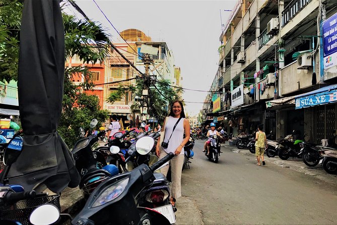 Ho Chi Minh city Street Food by scooter tour | female driver - Nighttime energy and the feeling of going out with friends