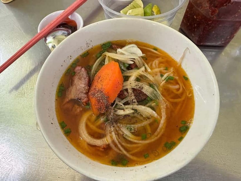 Ho Chi Minh City: Super Niche Walking Street Food Tour - Ho Thi Ky Food Street and its busy food stalls