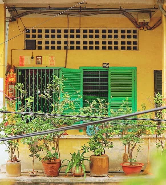 Ho Chi Minh City: Xom Cai Hidden Local Life Walking Tour - Hoa Binh Market, where daily shopping takes center stage