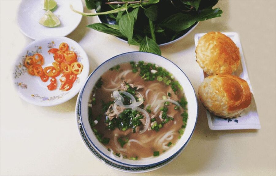 Ho Chi Minh: Full-Day Private City Tour - Cycling through markets toward Chinatown