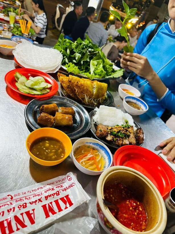 KISSTOUR | Motorbike Food Tour Female Drivers in Ho Chi Minh - Meeting the guides in blue ao dai