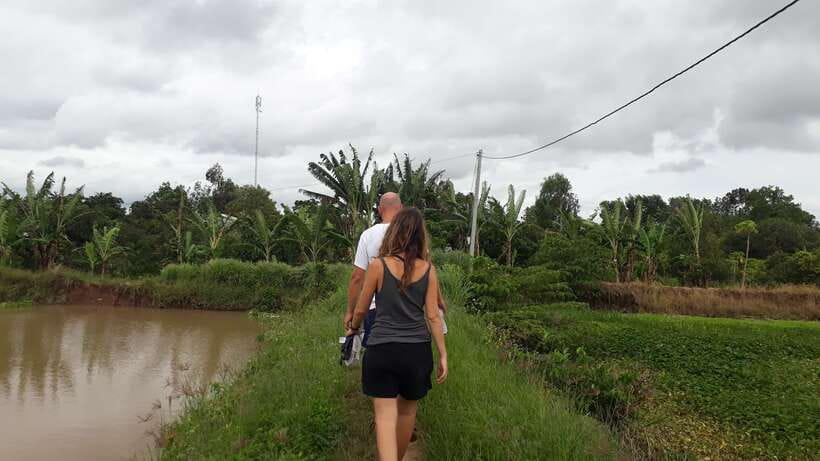 Mekong Day Tour by Car:Cai Be market, Local Island & Cycling - Village paths, local markets, and optional cycling