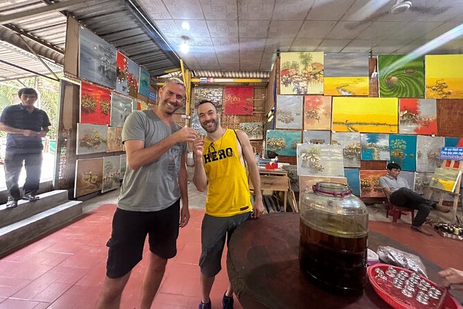 Mekong Delta Full Day Tour - The hand-rowed boat through narrow canals