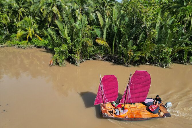 Mekong River Relaxing Sail boat cruise to Coconut Canals (1.5HRS) - The sunset question