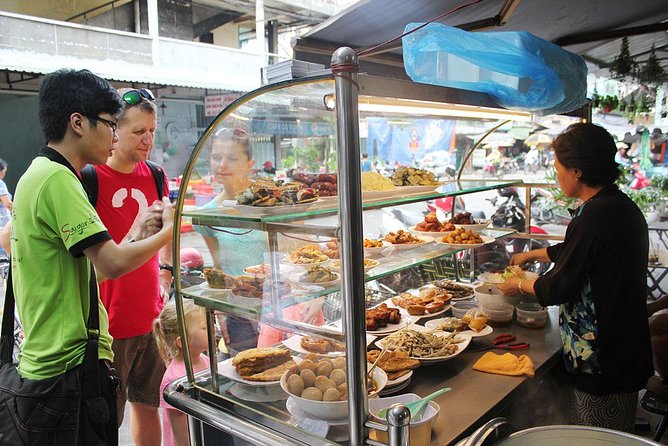 Morning Saigon Unseen+Street Food Tour with Ao Dai Riders Option - Nguyen Thien Thuat and the city behind the main roads