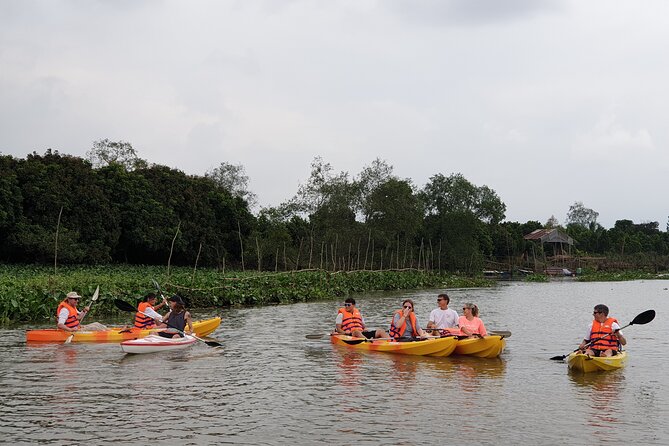 Off The Beaten Track The Mekong By Bike,boat & Kayak Day Trip - Cai Be Floating Market by local boat