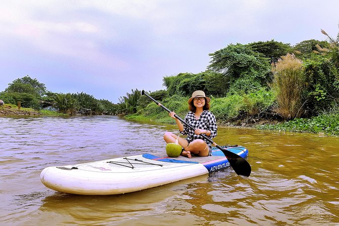 Paddling to explore the historic Vietnam War Rach Chiec jungle, - Coconut, Sunset, and Time to Look Around